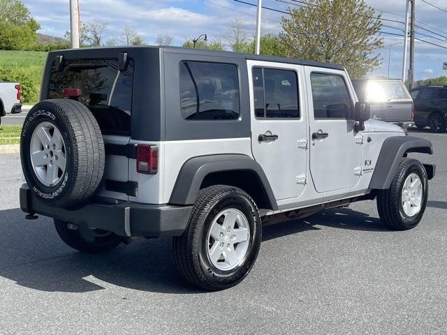 used 2009 Jeep Wrangler Unlimited car, priced at $12,900