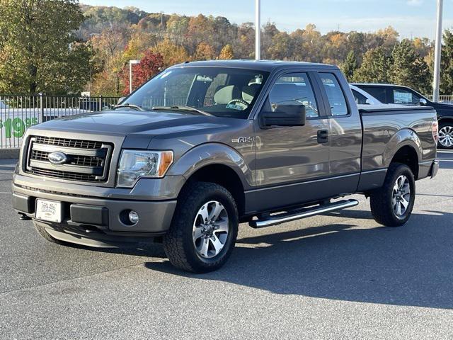 used 2014 Ford F-150 car, priced at $15,000