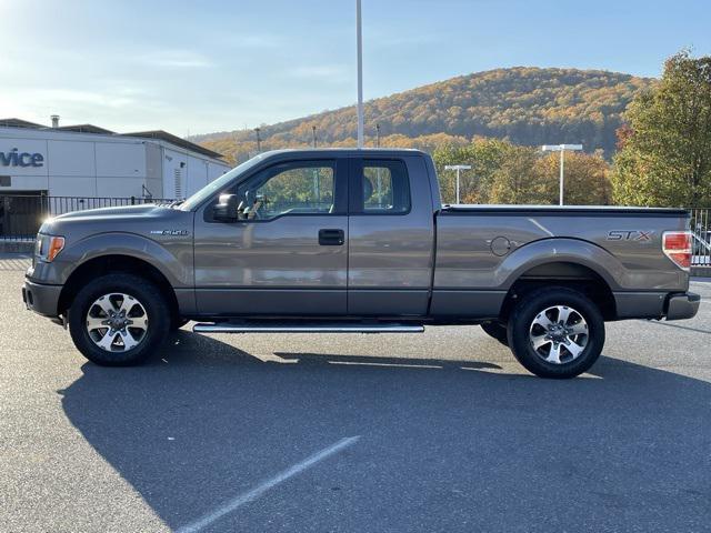 used 2014 Ford F-150 car, priced at $15,000