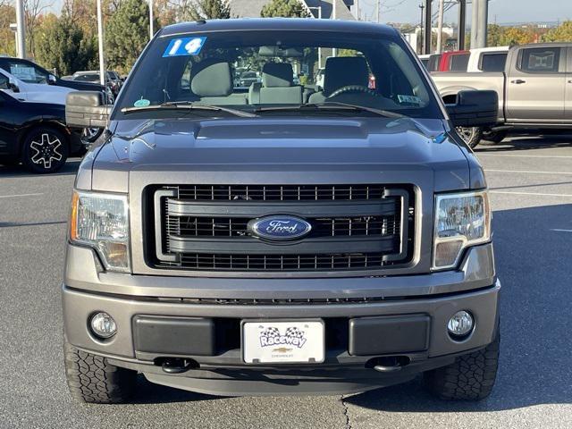 used 2014 Ford F-150 car, priced at $15,000