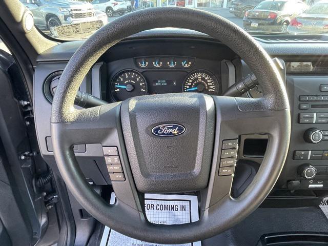 used 2014 Ford F-150 car, priced at $15,000