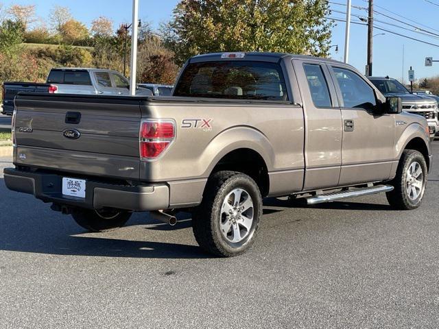 used 2014 Ford F-150 car, priced at $15,000