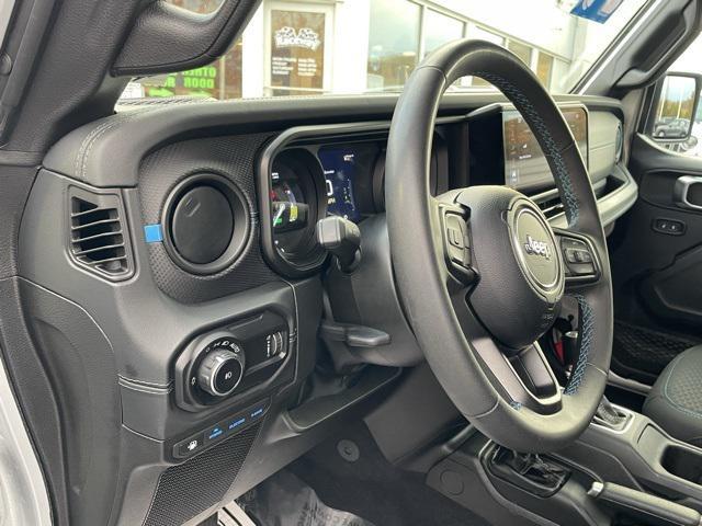 used 2024 Jeep Wrangler 4xe car, priced at $36,995