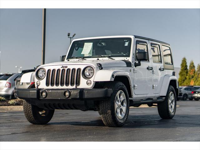 used 2015 Jeep Wrangler Unlimited car, priced at $16,990