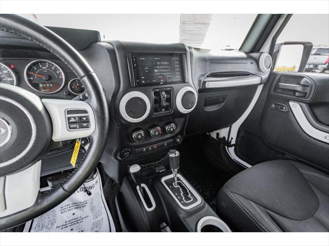 used 2015 Jeep Wrangler Unlimited car, priced at $16,990