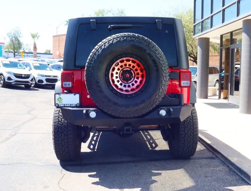 used 2014 Jeep Wrangler Unlimited car, priced at $26,995