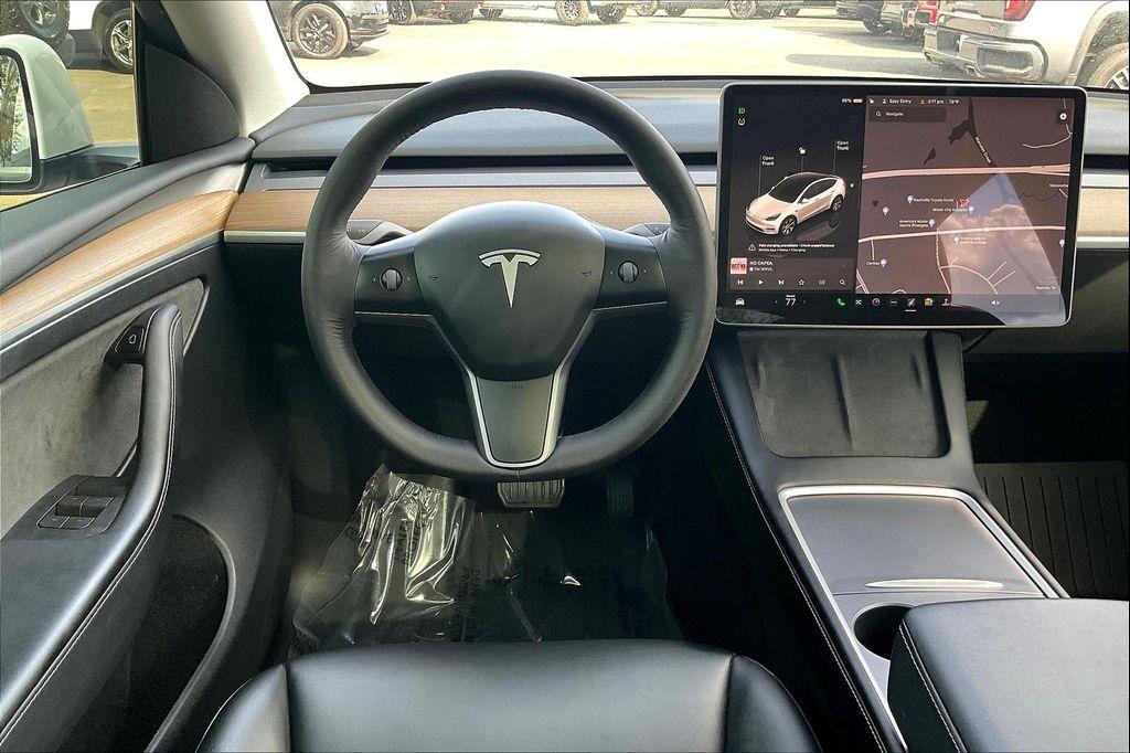 used 2023 Tesla Model Y car, priced at $30,557