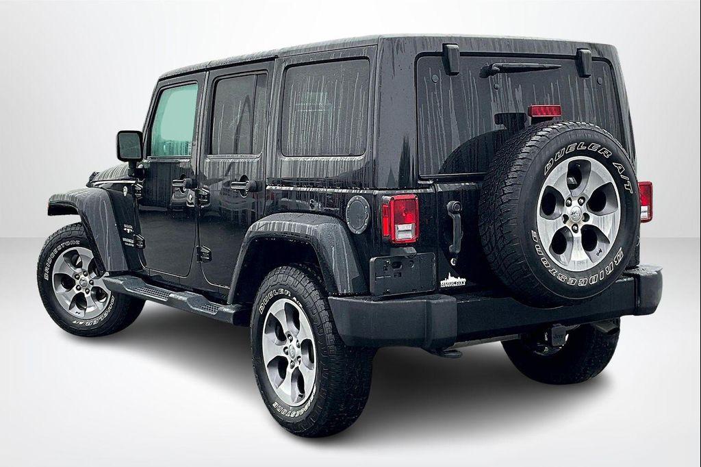 used 2016 Jeep Wrangler Unlimited car, priced at $19,449