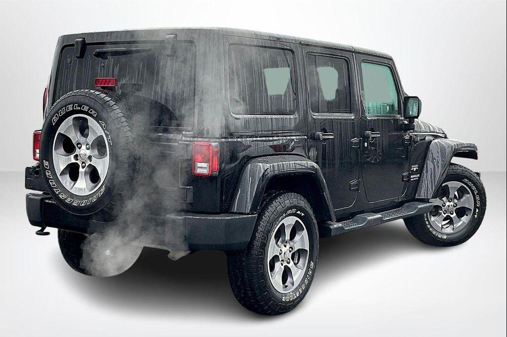 used 2016 Jeep Wrangler Unlimited car, priced at $19,449