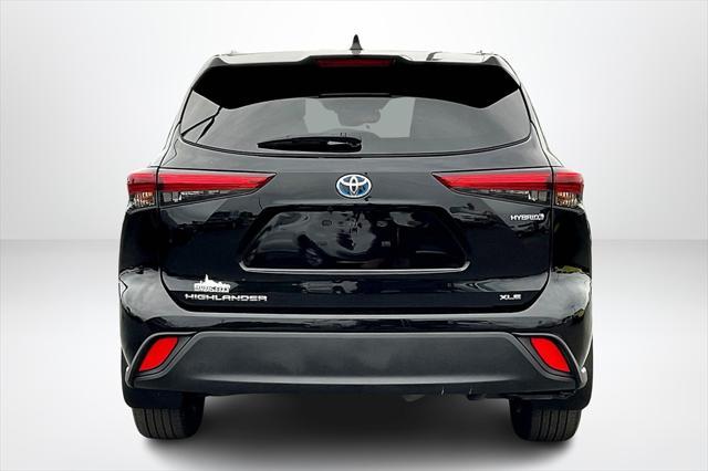 used 2021 Toyota Highlander Hybrid car, priced at $28,353