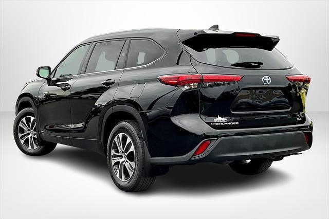 used 2021 Toyota Highlander Hybrid car, priced at $28,353