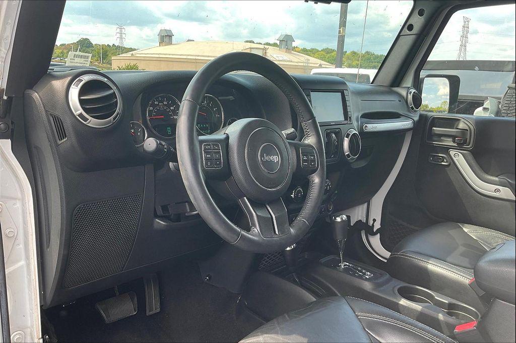 used 2016 Jeep Wrangler Unlimited car, priced at $27,900