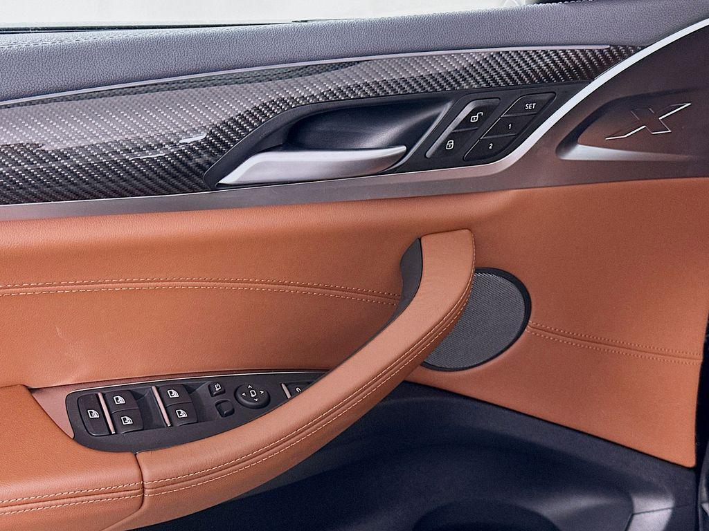 new 2025 BMW X4 M car, priced at $92,925