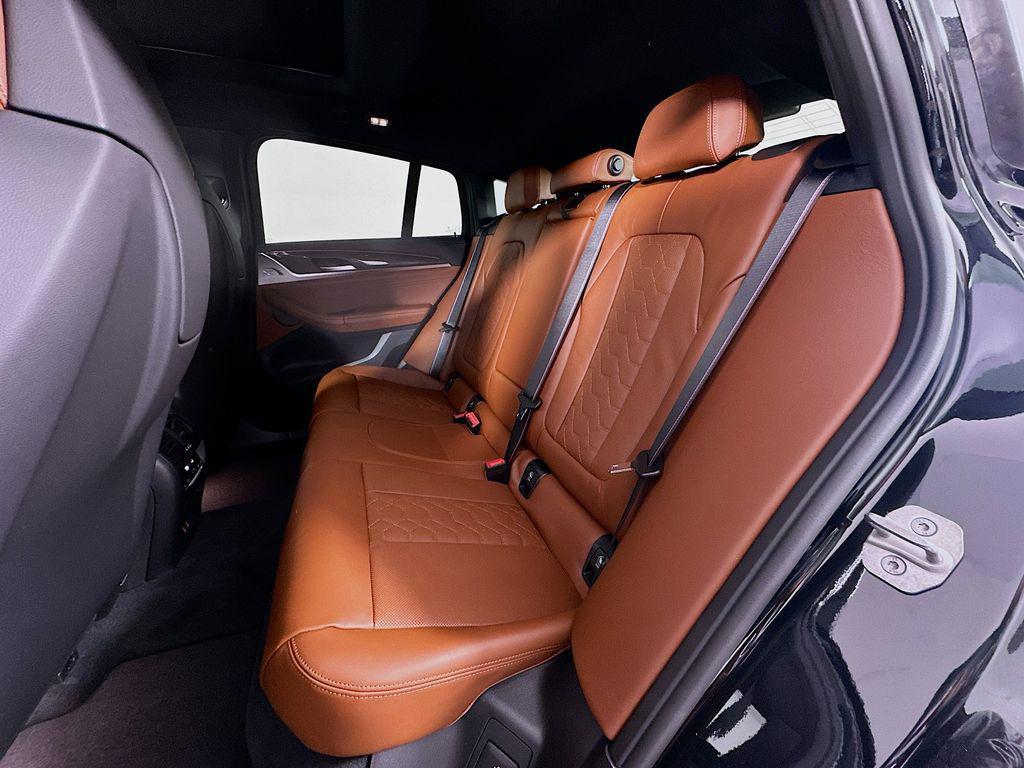 new 2025 BMW X4 M car, priced at $92,925