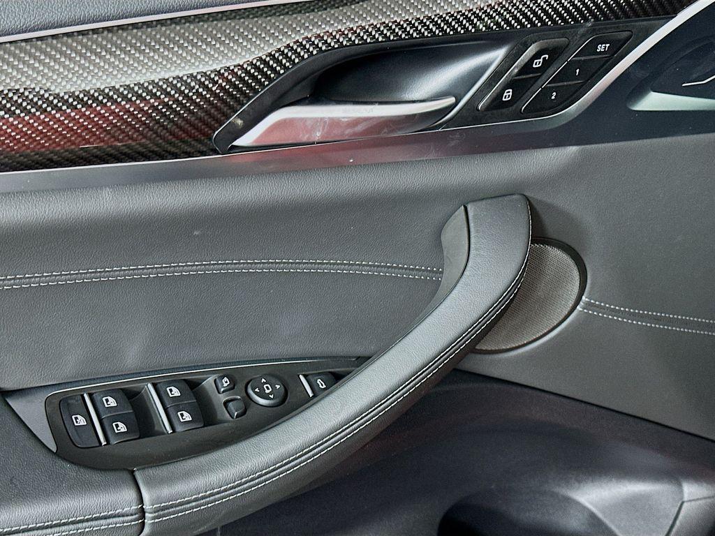 new 2025 BMW X4 M car, priced at $94,170