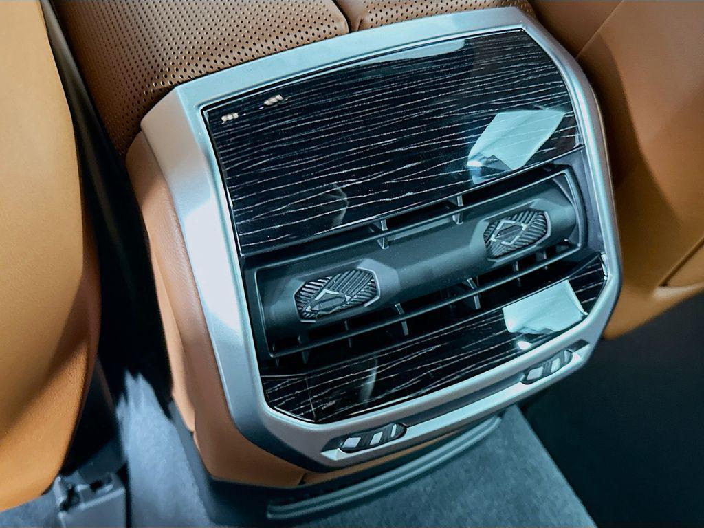 new 2025 BMW 740 car, priced at $117,030