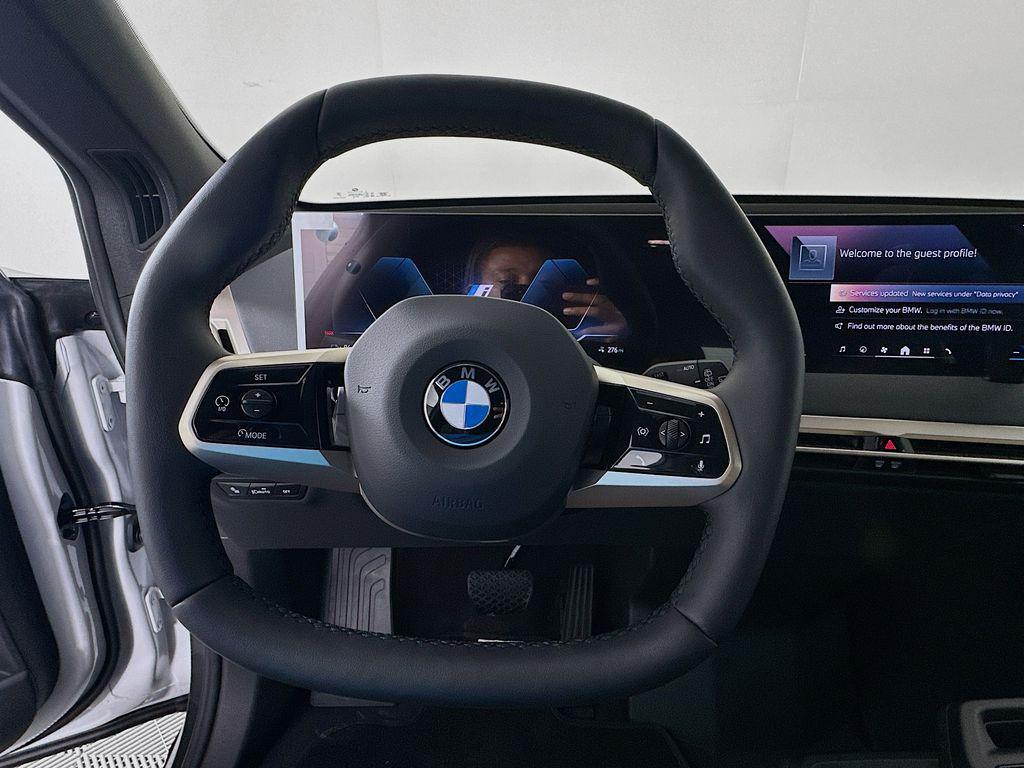 new 2026 BMW iX car, priced at $88,420