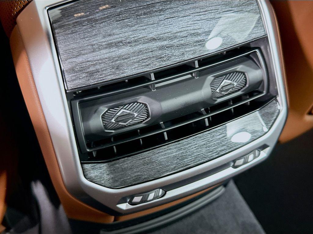 new 2025 BMW 740 car, priced at $112,425