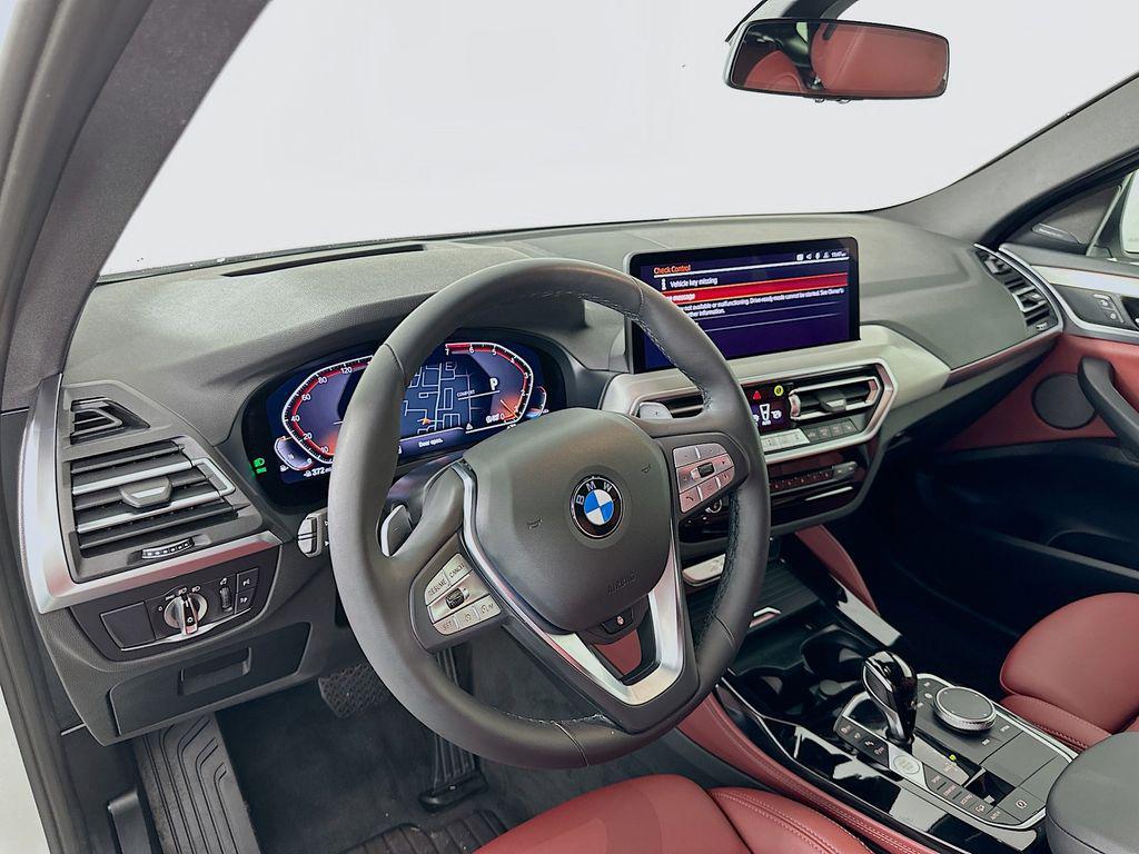 used 2025 BMW X4 car, priced at $51,980