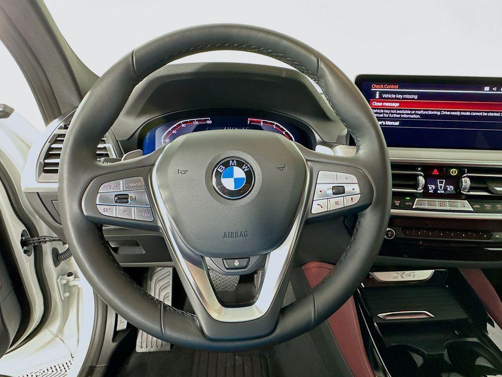 used 2025 BMW X4 car, priced at $51,980