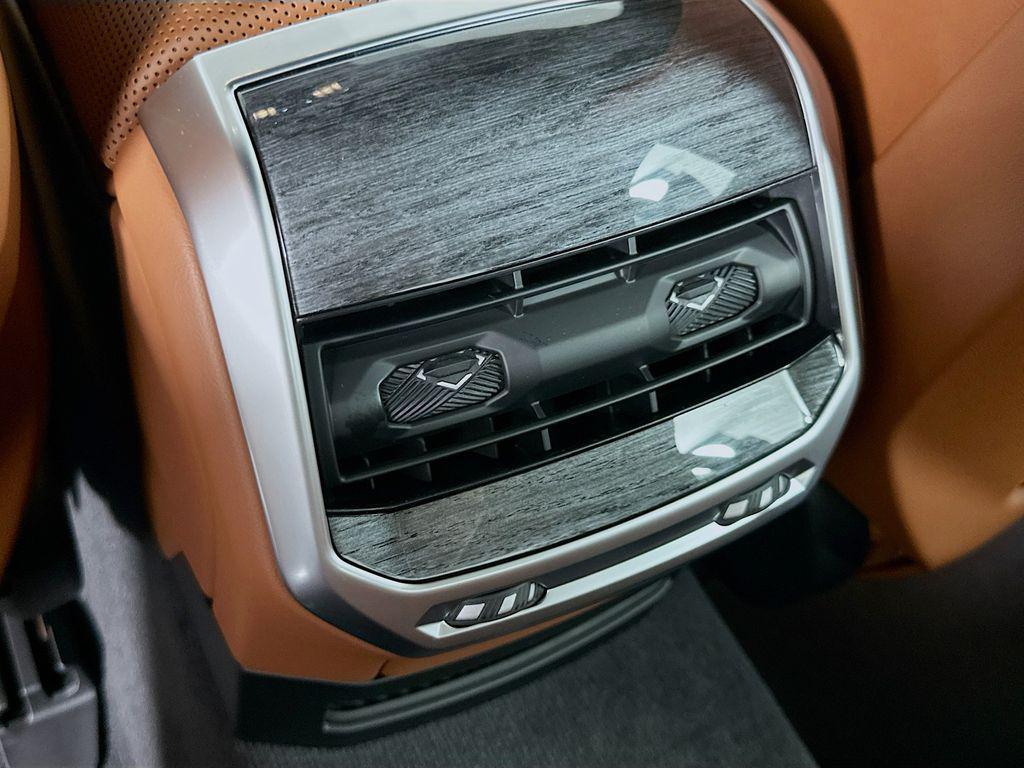 new 2025 BMW 740 car, priced at $115,235