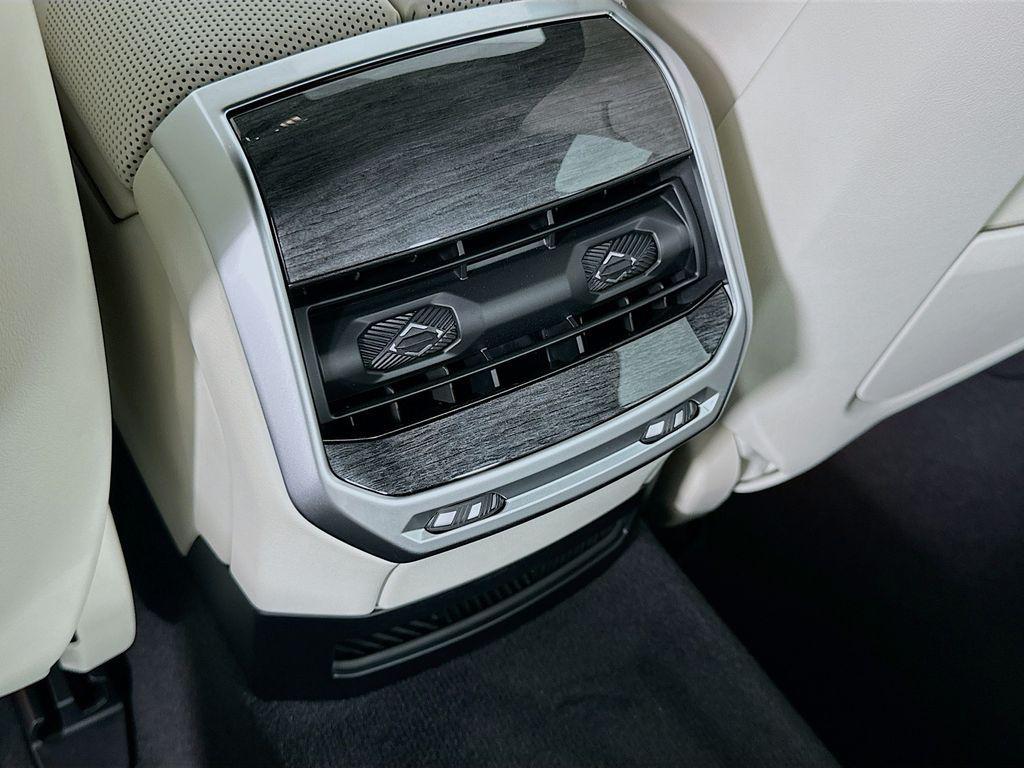 new 2025 BMW 740 car, priced at $112,200