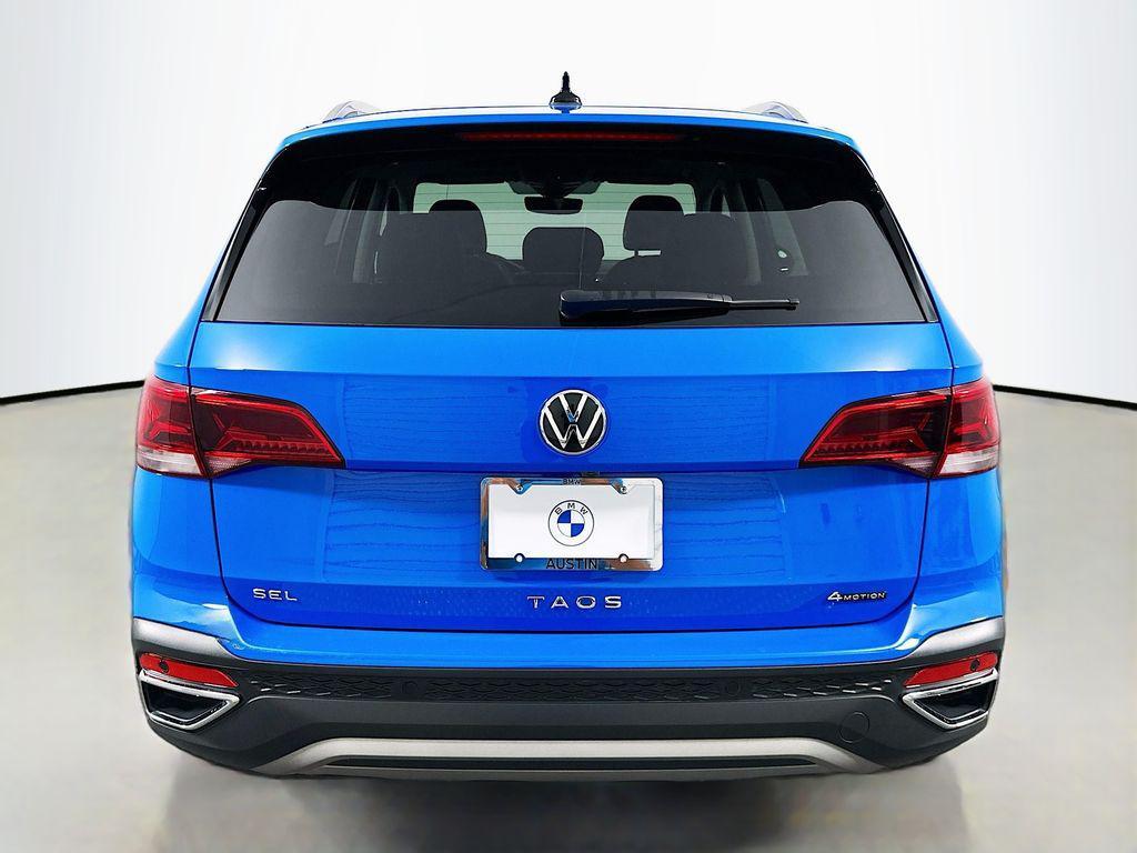used 2023 Volkswagen Taos car, priced at $25,111