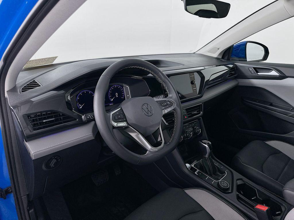 used 2023 Volkswagen Taos car, priced at $25,111
