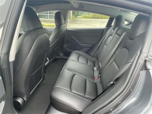 used 2023 Tesla Model 3 car, priced at $27,329