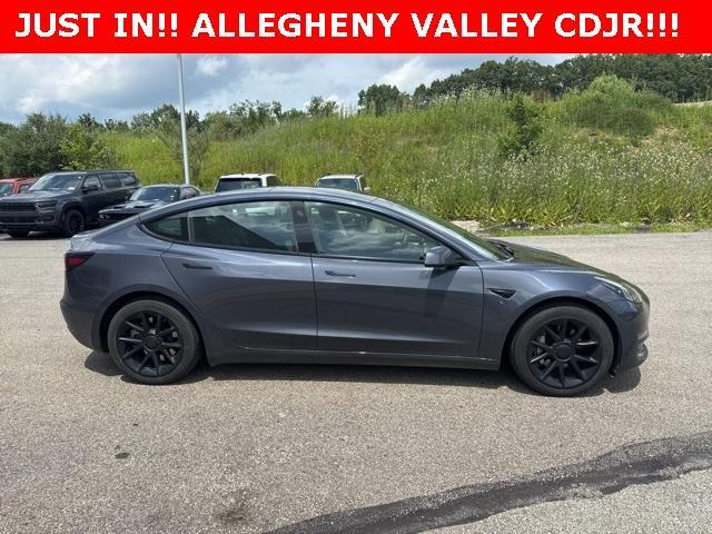 used 2023 Tesla Model 3 car, priced at $27,329