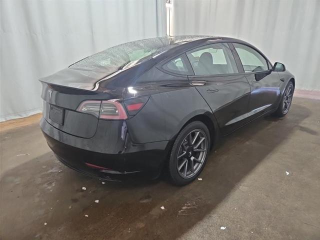 used 2023 Tesla Model 3 car, priced at $15,000