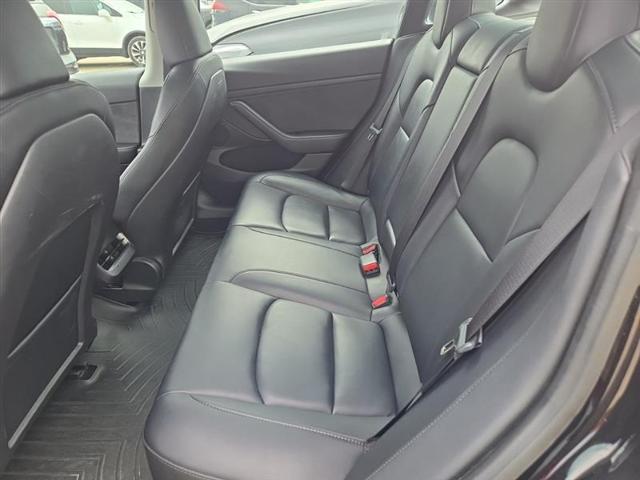 used 2023 Tesla Model 3 car, priced at $15,000