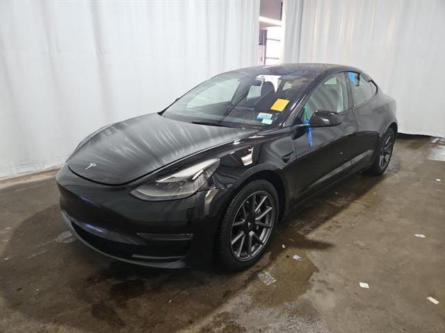 used 2023 Tesla Model 3 car, priced at $15,000