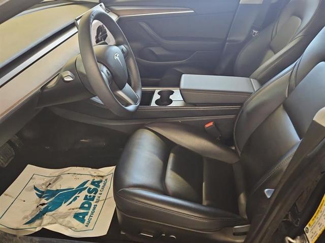 used 2023 Tesla Model 3 car, priced at $15,000