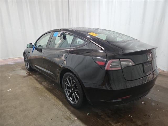 used 2023 Tesla Model 3 car, priced at $15,000