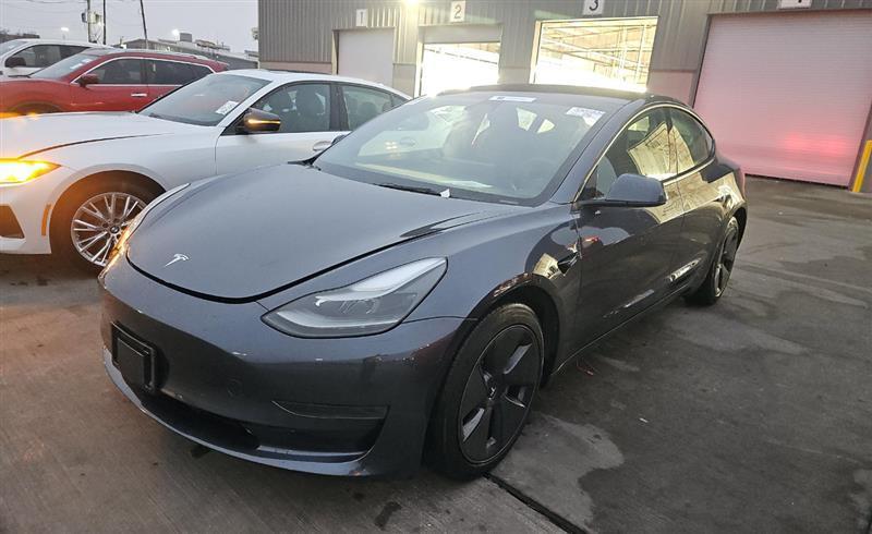 used 2023 Tesla Model 3 car, priced at $21,000