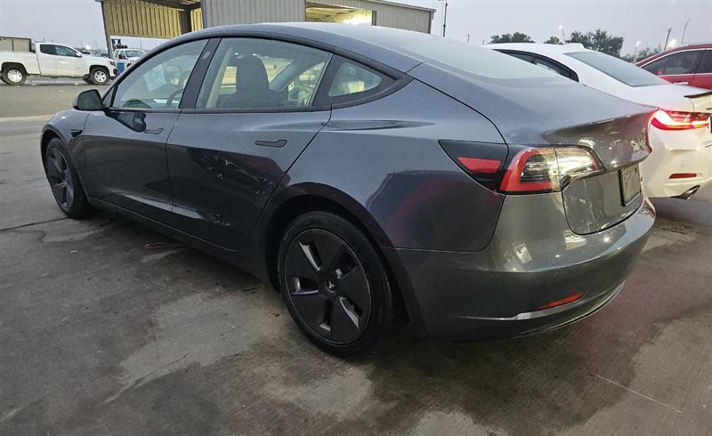 used 2023 Tesla Model 3 car, priced at $21,000