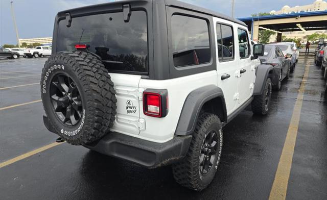 used 2023 Jeep Wrangler car, priced at $33,900