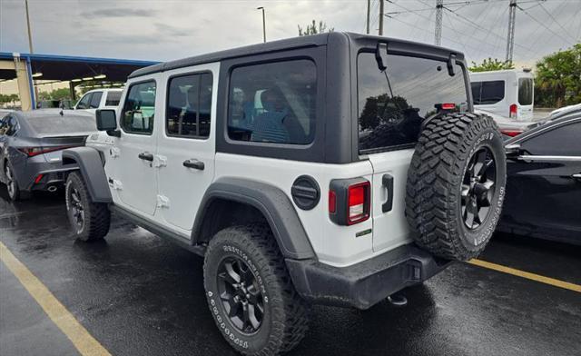 used 2023 Jeep Wrangler car, priced at $33,900
