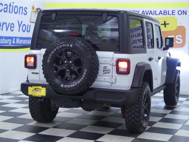 used 2023 Jeep Wrangler car, priced at $33,900