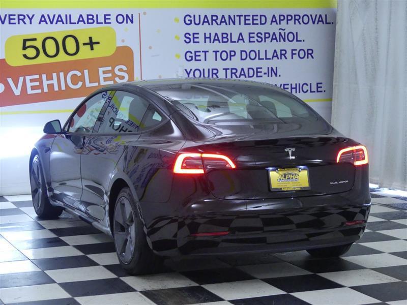 used 2023 Tesla Model 3 car, priced at $26,900