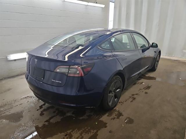 used 2022 Tesla Model 3 car, priced at $22,500