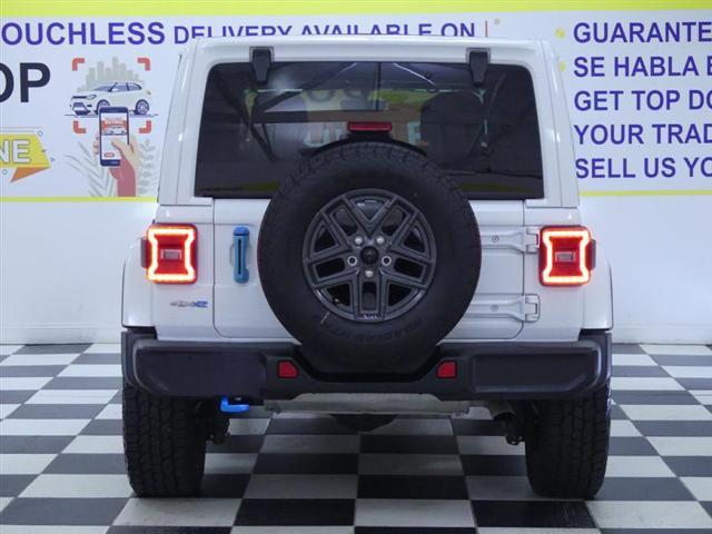 used 2023 Jeep Wrangler 4xe car, priced at $31,999