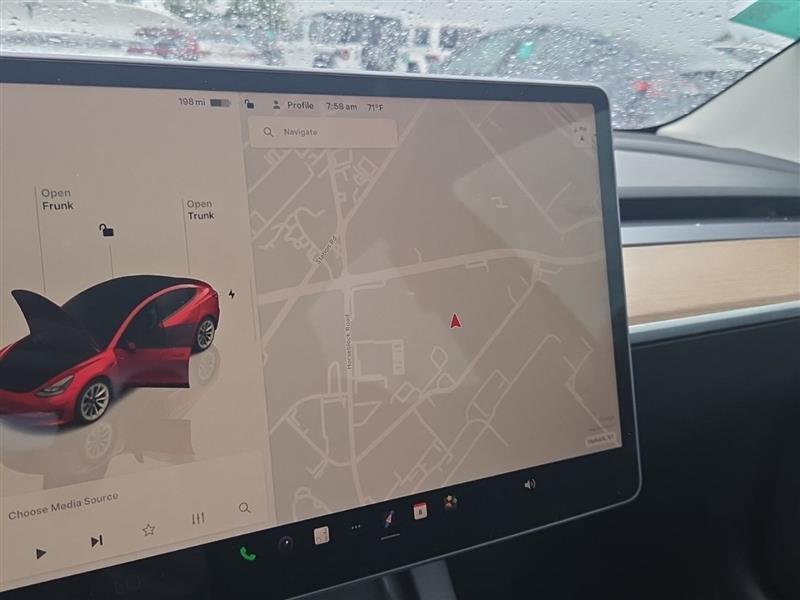 used 2022 Tesla Model 3 car, priced at $23,500