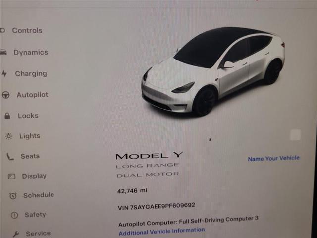 used 2023 Tesla Model Y car, priced at $24,500