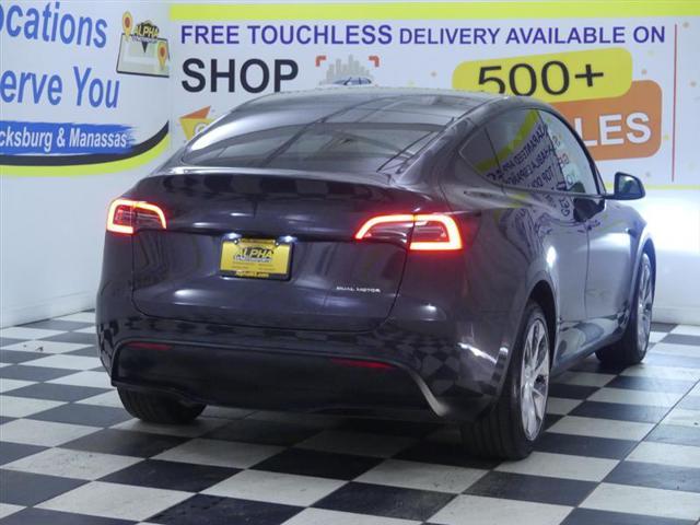 used 2024 Tesla Model Y car, priced at $32,000