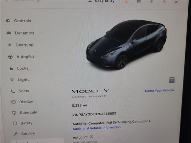 used 2025 Tesla Model Y car, priced at $33,500