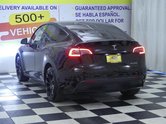 used 2021 Tesla Model Y car, priced at $24,300