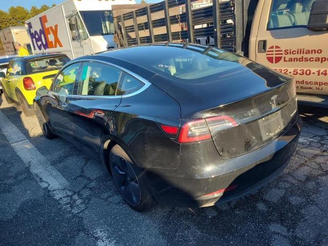 used 2018 Tesla Model 3 car, priced at $20,000