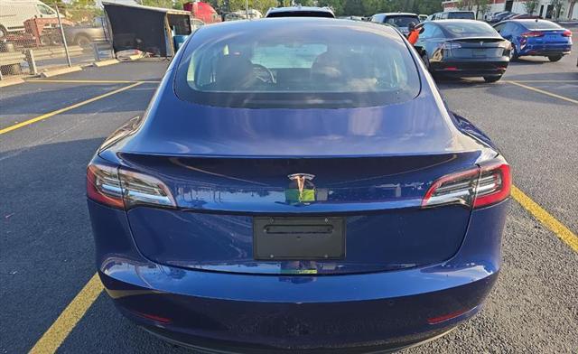 used 2022 Tesla Model 3 car, priced at $21,000